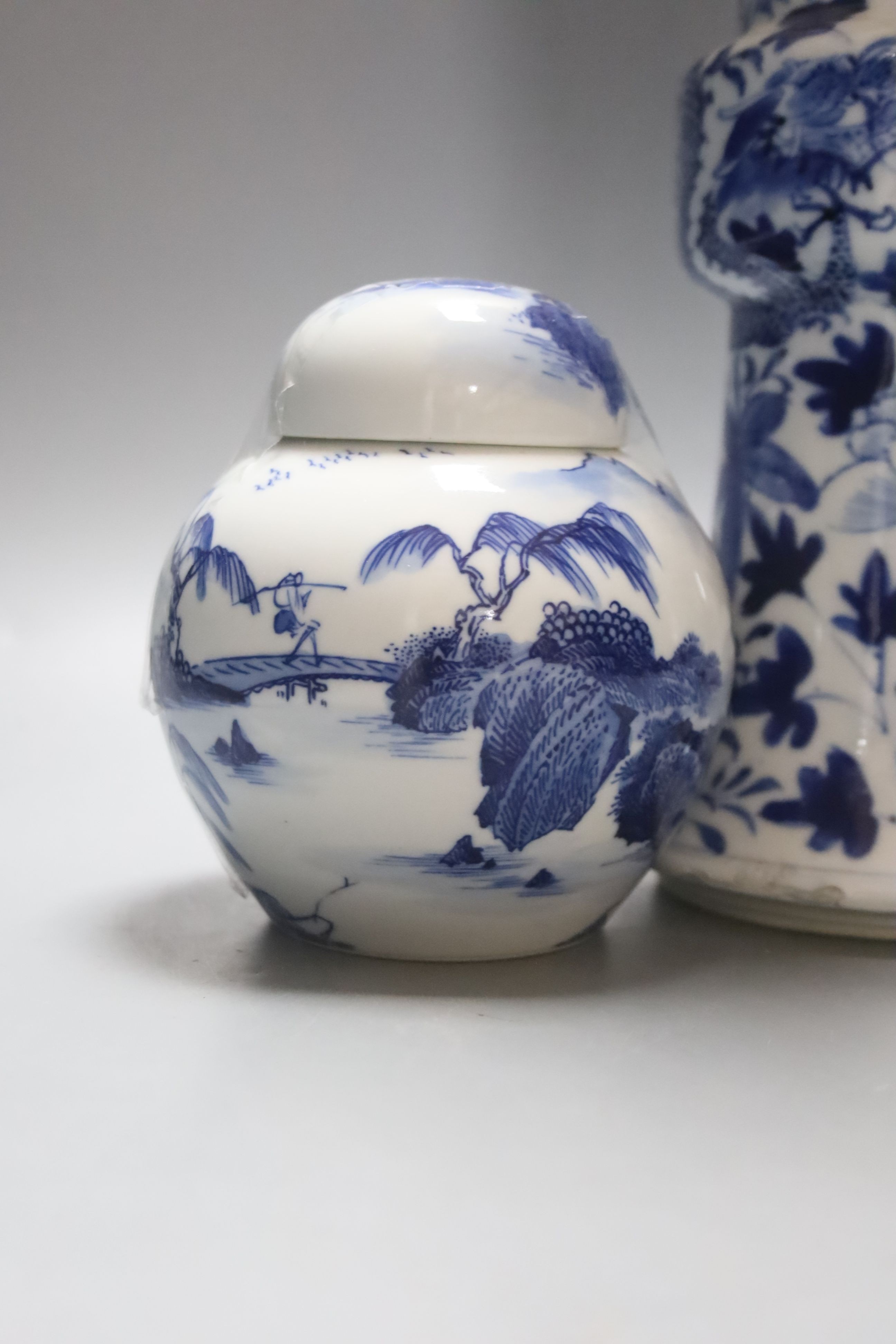 Two 19th century Chinese blue and white vases, an 18th Century blue and white jug and a later jar and cover, tallest 30cm